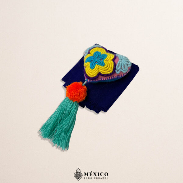 Purple Mexican waist belt featuring a heart embellishment made of multicolor yarn and pom-poms