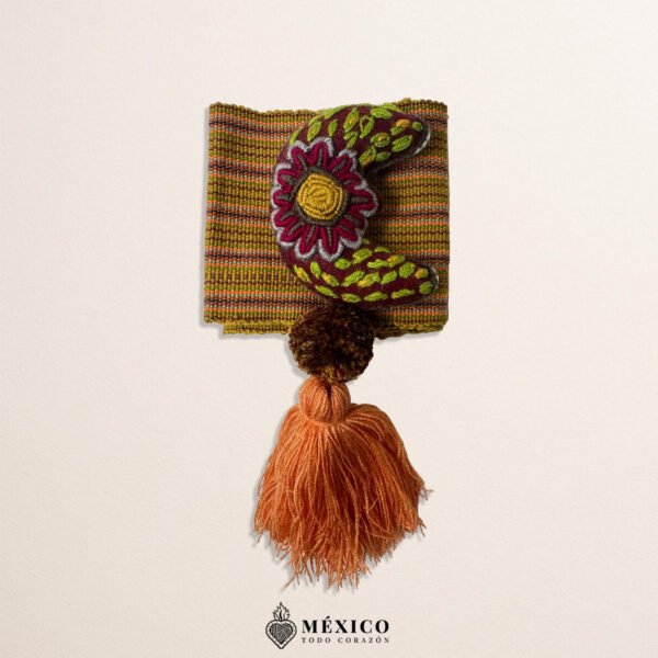 Brown artisan Mexican waist belt featuring a moon embellishment and pom-poms