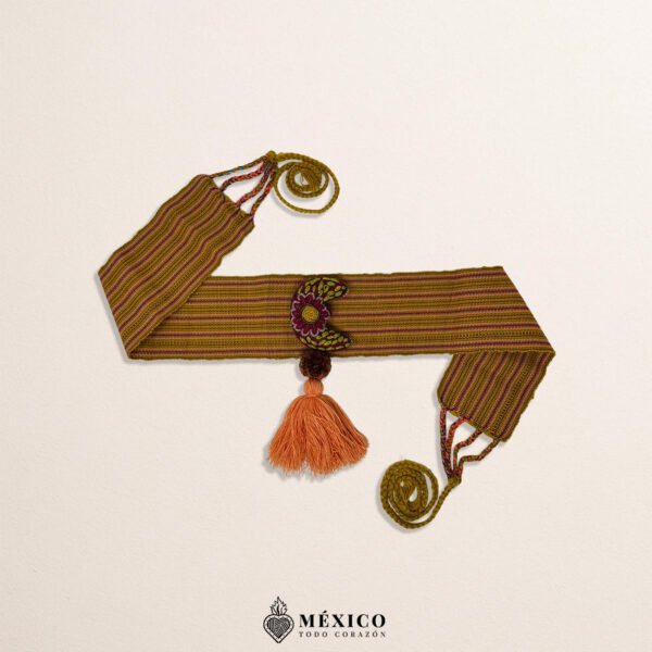 Brown artisan Mexican waist belt featuring a moon embellishment and pom-poms
