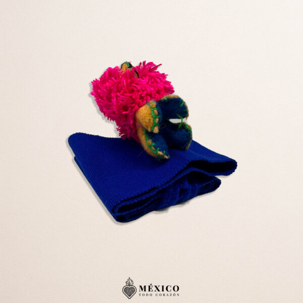 Blue artisan Mexican waist belt featuring a lion embellishment with a pink mane