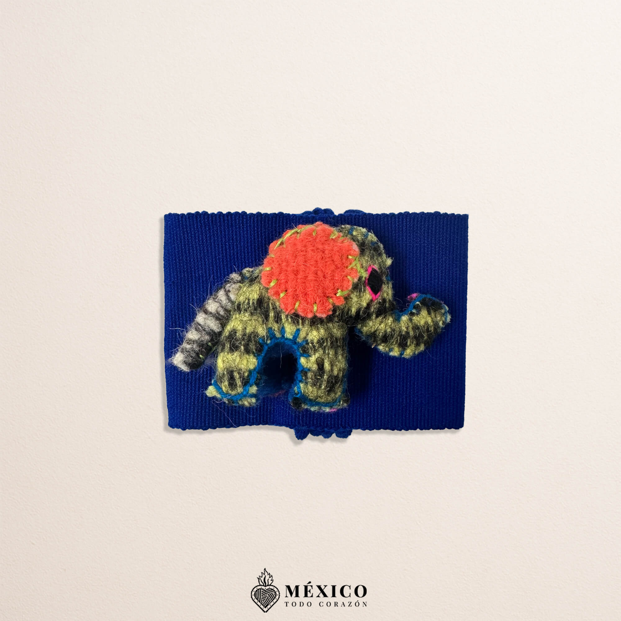 Blue artisan Mexican waist belt featuring an adorable elephant embellishment crafted in yarn and felt