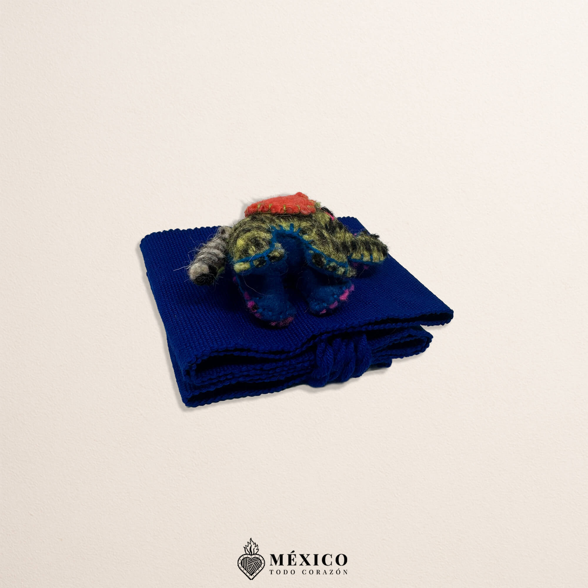 Blue artisan Mexican waist belt featuring an adorable elephant embellishment crafted in yarn and felt