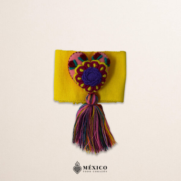 Yellow artisan Mexican waist belt featuring a floral heart embellishment in multicolor felt