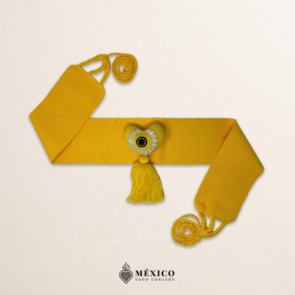 Yellow artisan Mexican waist belt featuring a heart embellishment crafted in yellow felt