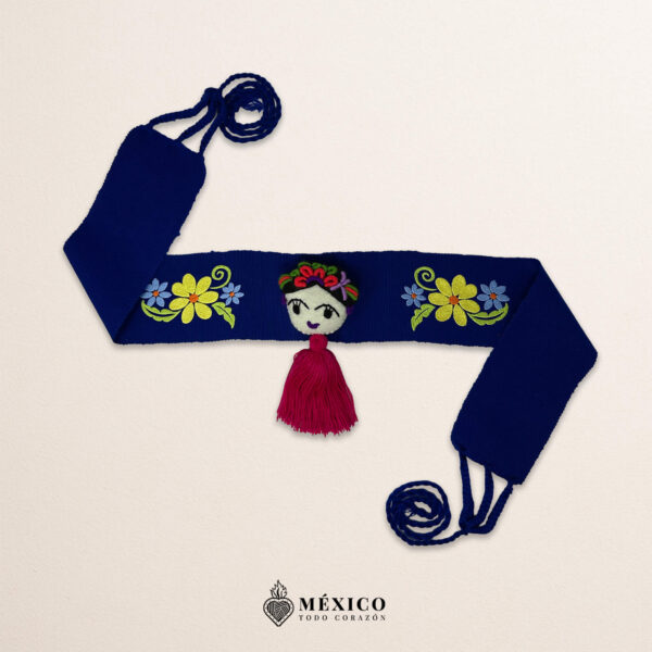 Blue artisan waist belt featuring floral embroidery and a Mexican doll embellishment
