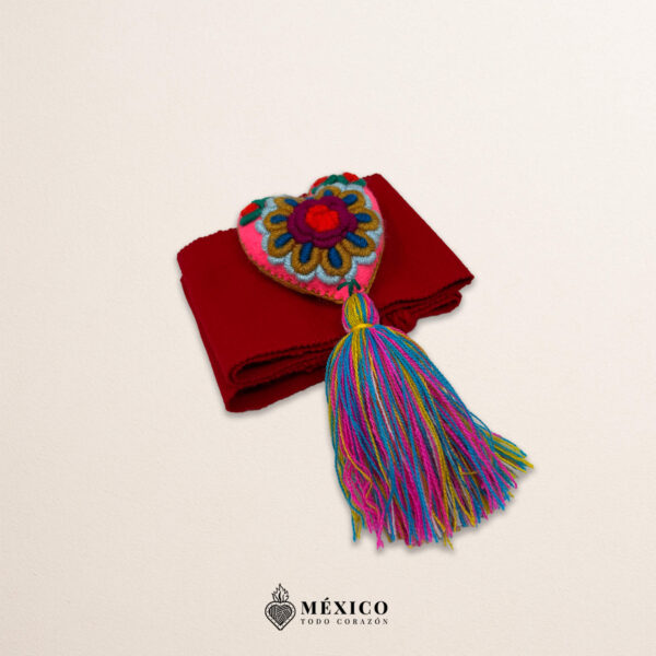 Red artisan Mexican waist belt featuring a floral heart embellishment in felt appliqué