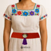 Orange artisan Mexican waist belt featuring a Mexican doll embellishment in felt appliqué