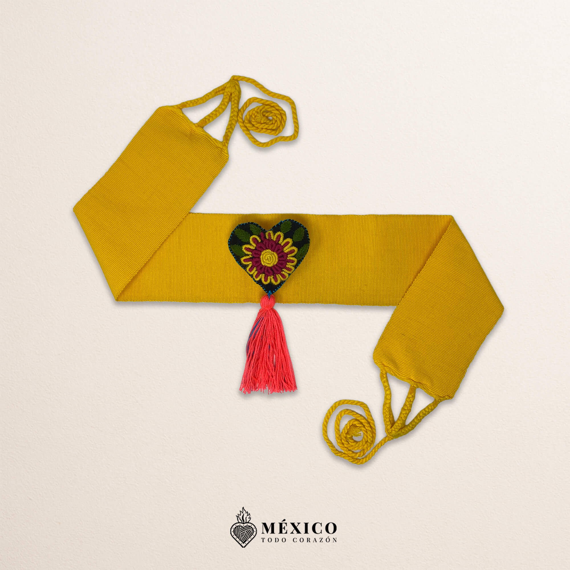 Yellow artisan Mexican waist belt featuring a floral heart embellishment in felt appliqué