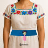 Light blue artisan waist belt featuring a Mexican doll embellishment in felt appliqué