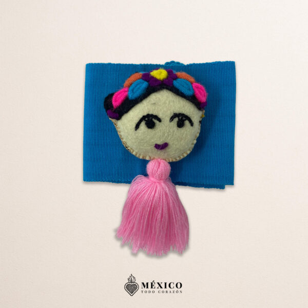 Light blue artisan waist belt featuring a Mexican doll embellishment in felt appliqué