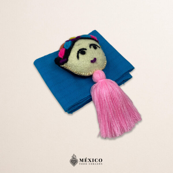 Light blue artisan waist belt featuring a Mexican doll embellishment in felt appliqué