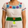 Green artisan Mexican waist belt featuring an orange heart embellishment in felt appliqué