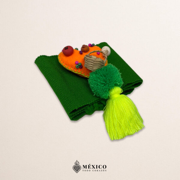 Green artisan Mexican waist belt featuring an orange heart embellishment in felt appliqué