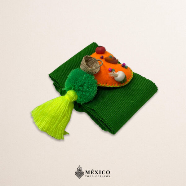 Green artisan Mexican waist belt featuring an orange heart embellishment in felt appliqué