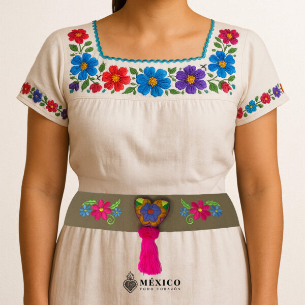 Beige waist belt featuring floral embroidery and a heart embellishment in felt appliqué
