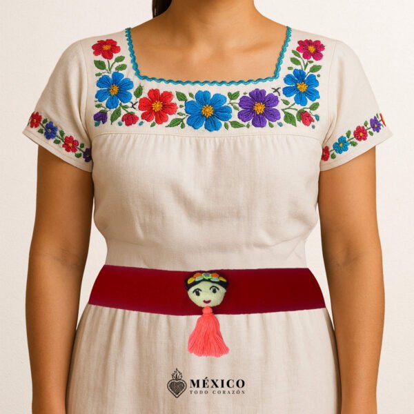 Red artisan Mexican waist belt featuring a Mexican doll embellishment in felt appliqué