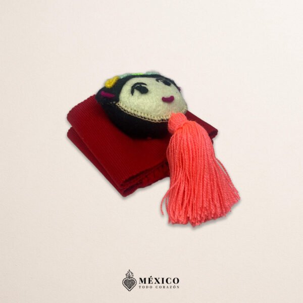 Red artisan Mexican waist belt featuring a Mexican doll embellishment in felt appliqué