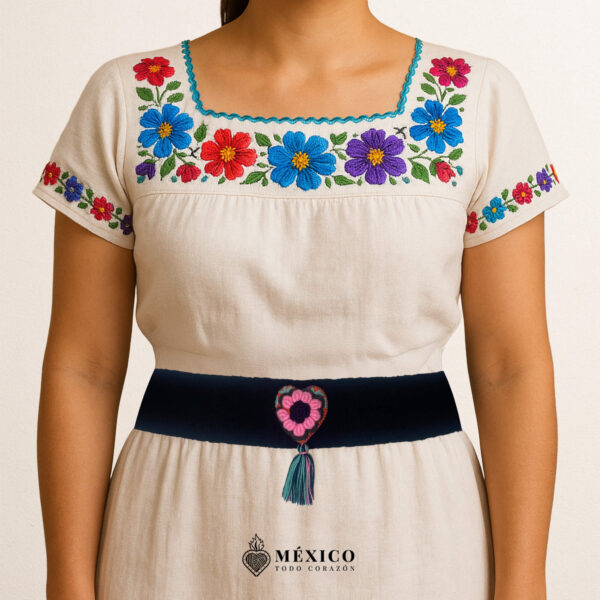 Black artisan Mexican waist belt featuring a floral heart embellishment in felt appliqué