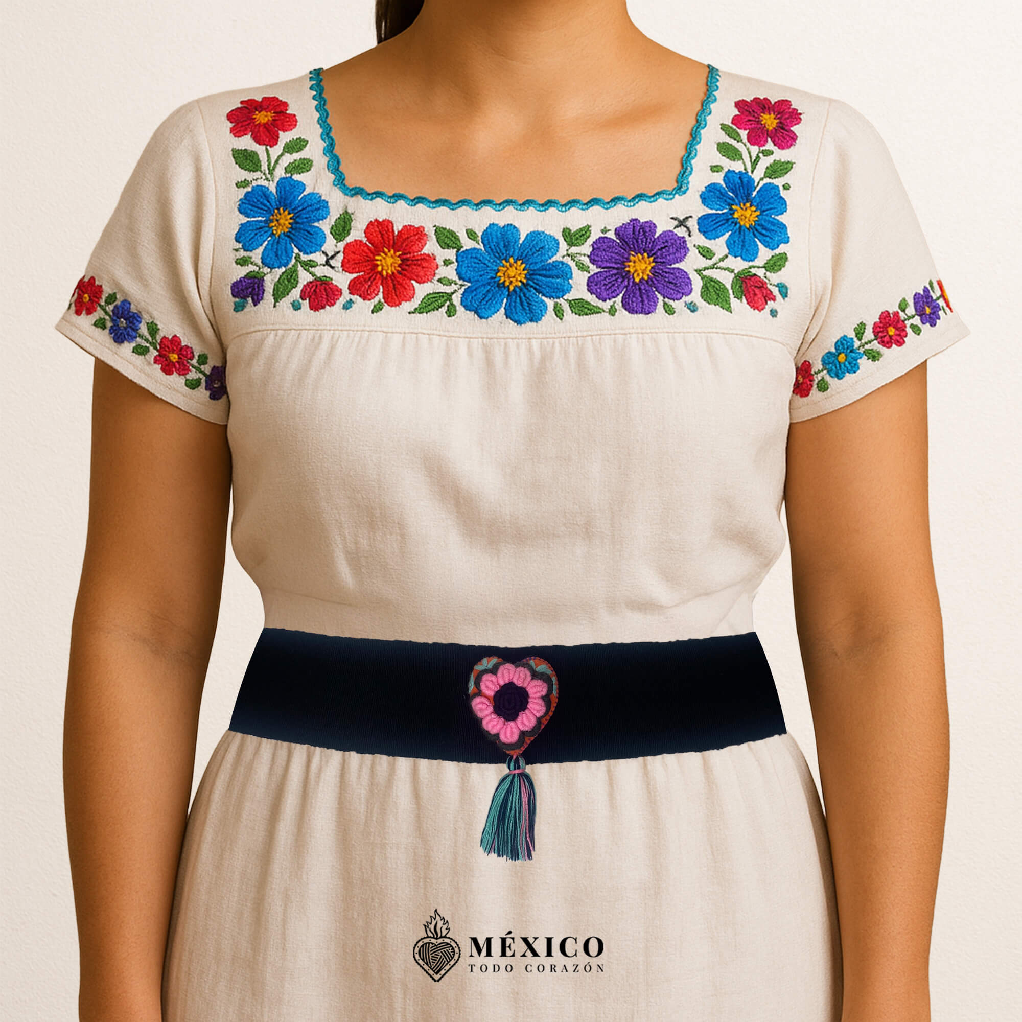 Black artisan Mexican waist belt featuring a floral heart embellishment in felt appliqué