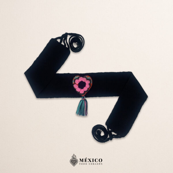Black artisan Mexican waist belt featuring a floral heart embellishment in felt appliqué