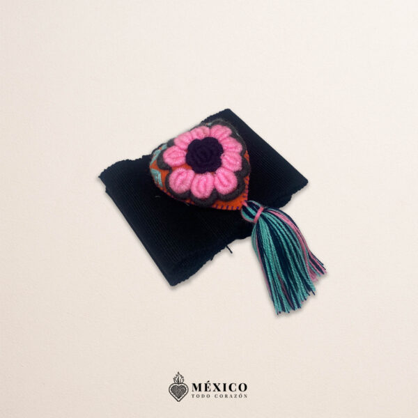 Black artisan Mexican waist belt featuring a floral heart embellishment in felt appliqué