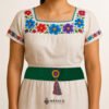 Green artisan Mexican waist belt featuring a floral heart embellishment in multicolor felt