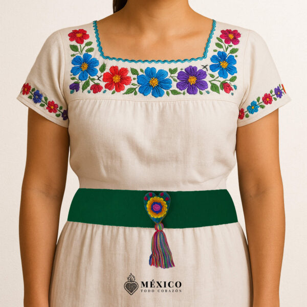 Green artisan Mexican waist belt featuring a floral heart embellishment in multicolor felt