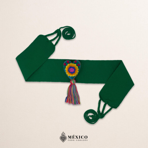 Green artisan Mexican waist belt featuring a floral heart embellishment in multicolor felt
