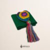 Green artisan Mexican waist belt featuring a floral heart embellishment in multicolor felt