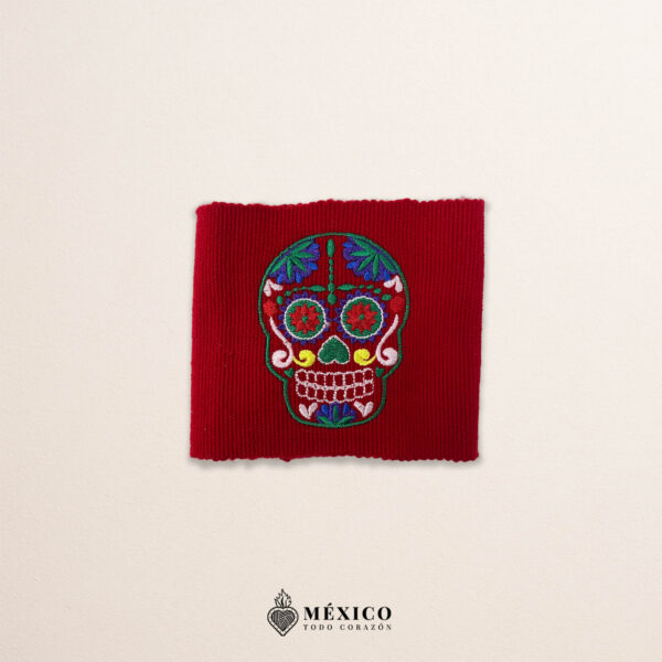 Handcrafted red Mexican waist belt (faja) featuring colorful sugar skull embroidery
