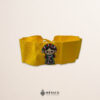 Handcrafted yellow faja waist belt featuring traditional Mexican doll embroidery