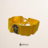 Handcrafted yellow faja waist belt featuring traditional Mexican doll embroidery