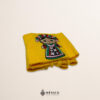 Handcrafted yellow faja waist belt featuring traditional Mexican doll embroidery