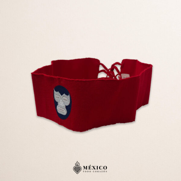 Handcrafted red faja Mexican waist belt featuring an embroidered luchador mask design