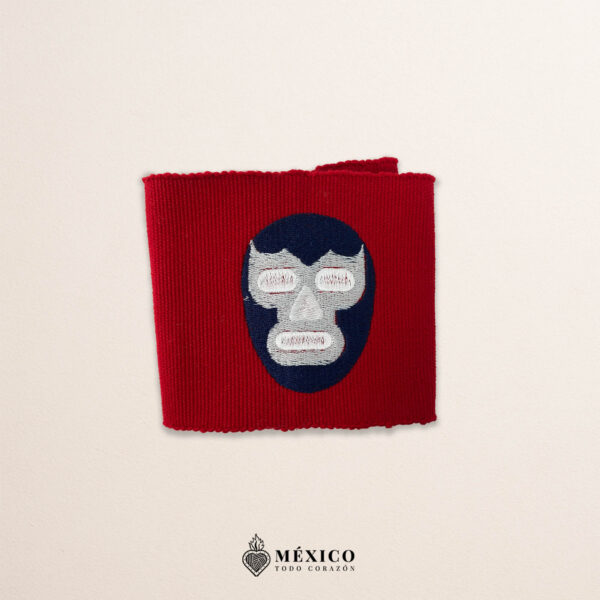 Handcrafted red faja Mexican waist belt featuring an embroidered luchador mask design