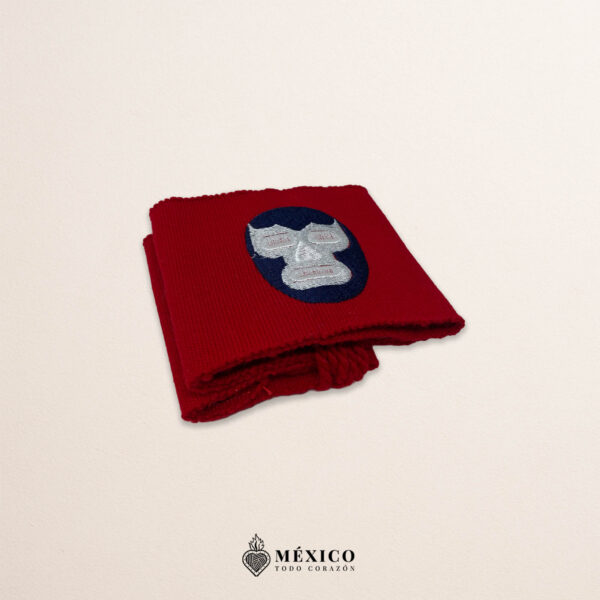 Handcrafted red faja Mexican waist belt featuring an embroidered luchador mask design