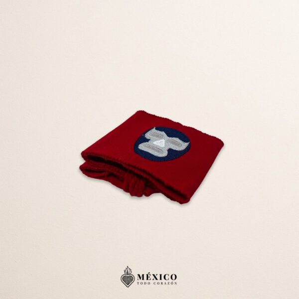 Handcrafted red faja Mexican waist belt featuring an embroidered luchador mask design