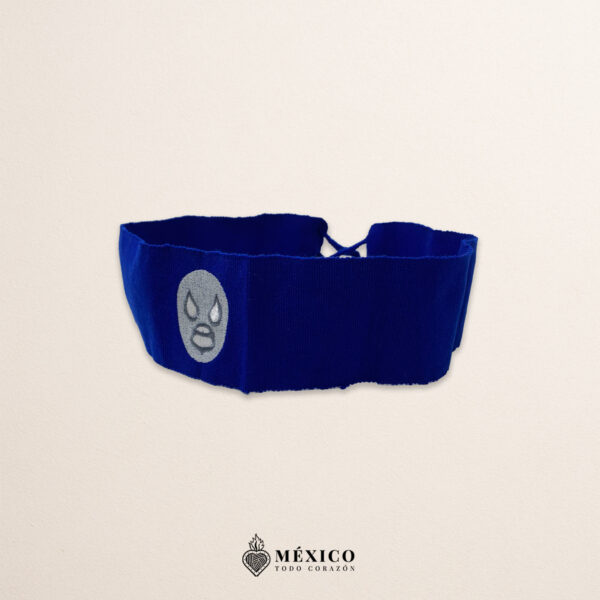 Handcrafted blue faja Mexican waist belt featuring an embroidered luchador mask design