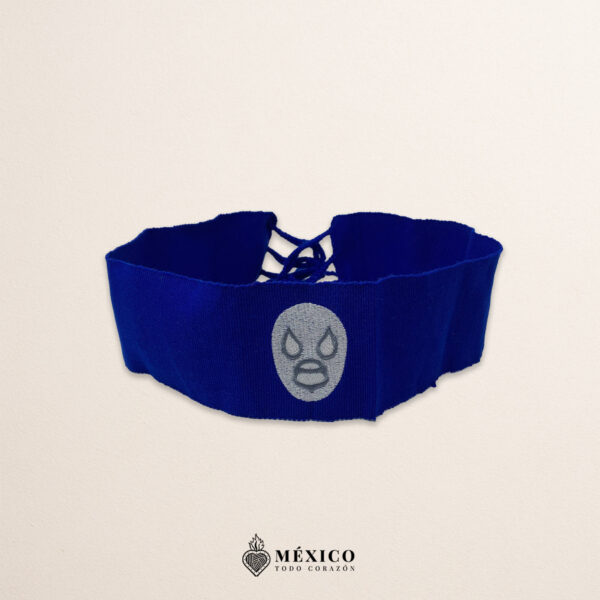 Handcrafted blue faja Mexican waist belt featuring an embroidered luchador mask design