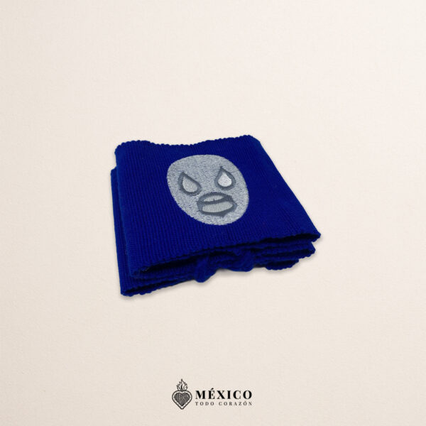 Handcrafted blue faja Mexican waist belt featuring an embroidered luchador mask design