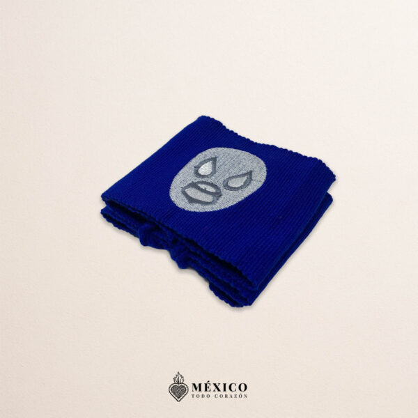 Handcrafted blue faja Mexican waist belt featuring an embroidered luchador mask design