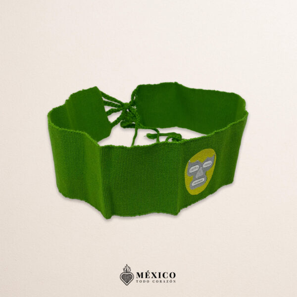 Handcrafted green faja Mexican waist belt featuring an embroidered luchador mask design