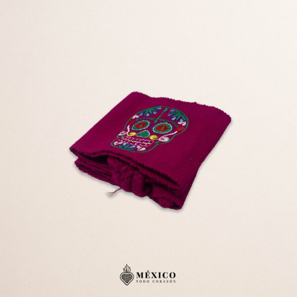 Handcrafted wine red faja Mexican waist belt featuring colorful sugar skull embroidery