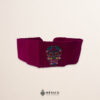 Handcrafted wine red faja Mexican waist belt featuring colorful sugar skull embroidery