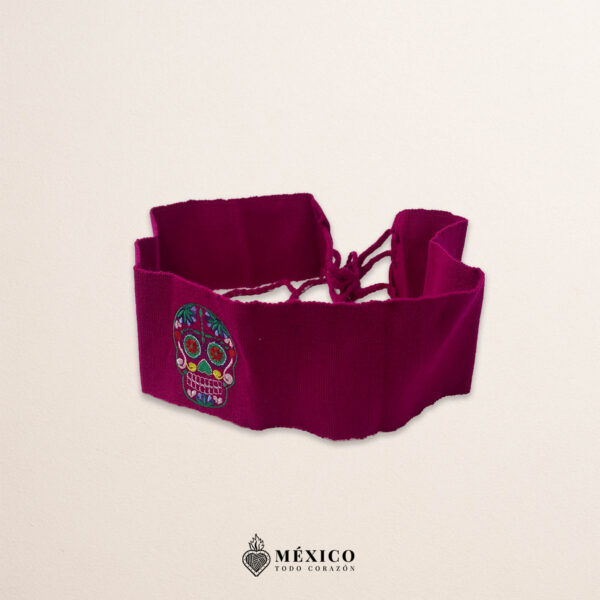 Handcrafted wine red faja Mexican waist belt featuring colorful sugar skull embroidery