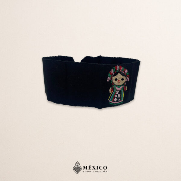 Handcrafted black faja Mexican waist belt featuring traditional Mexican doll embroidery