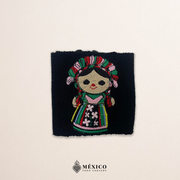 Handcrafted black faja Mexican waist belt featuring traditional Mexican doll embroidery
