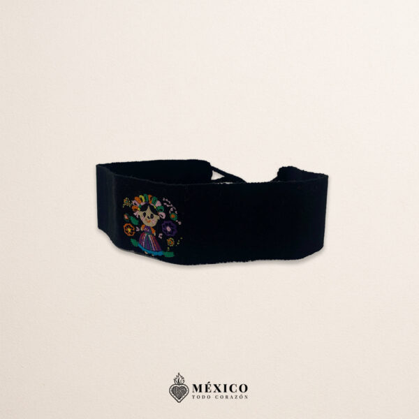 Handcrafted black faja mini Mexican waist belt featuring traditional Mexican doll embroidery