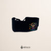 Handcrafted black faja mini Mexican waist belt featuring traditional Mexican doll embroidery