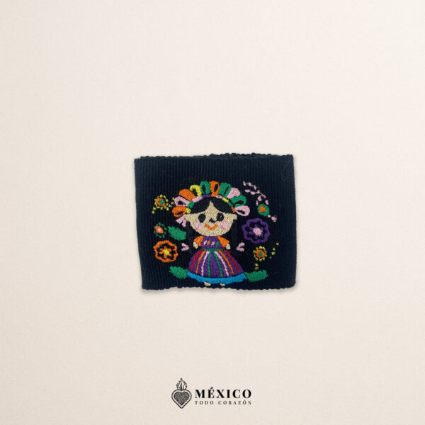 Handcrafted black faja mini Mexican waist belt featuring traditional Mexican doll embroidery